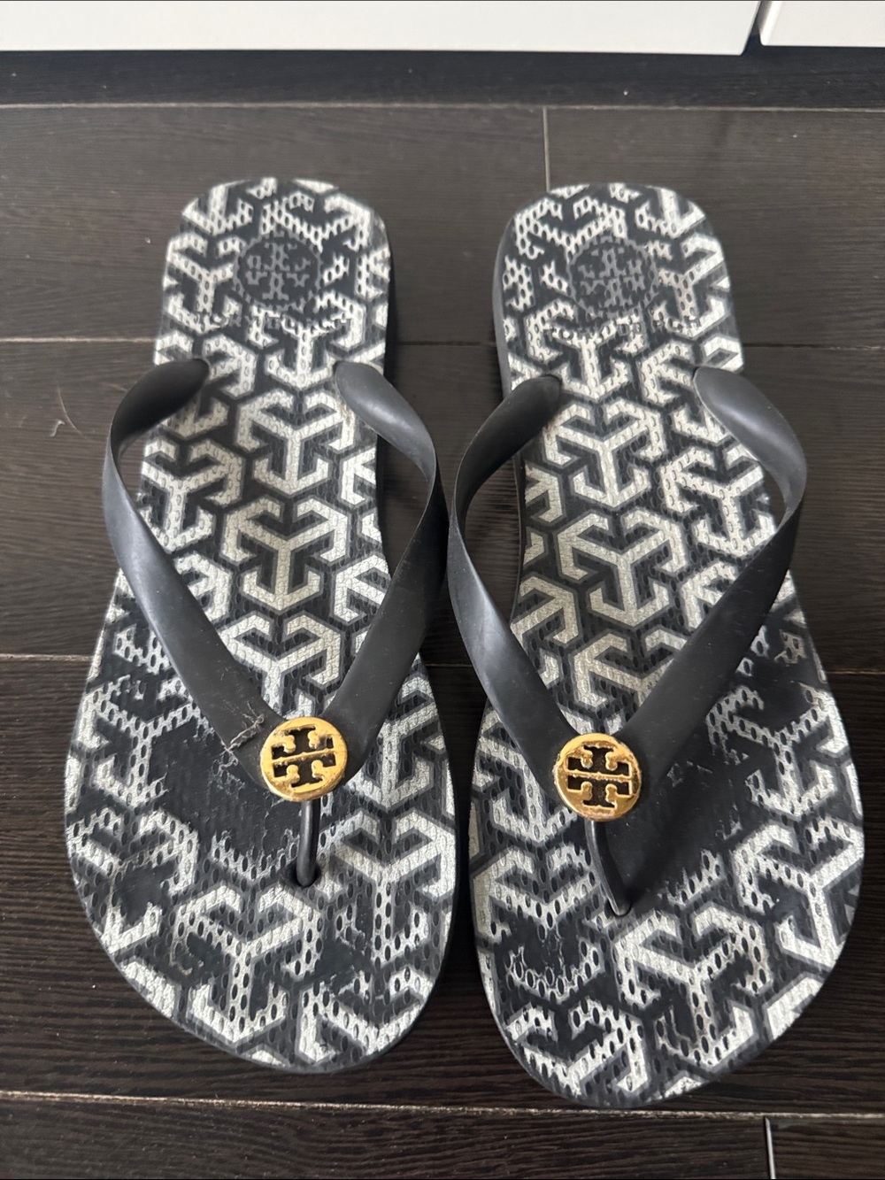 Tory Burch Black Strappy Flip Flops with Gold Logo